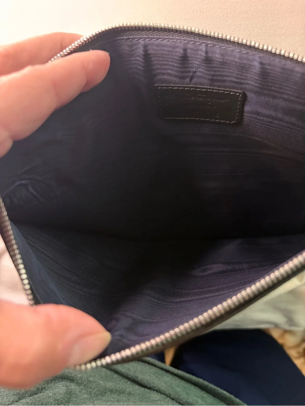Salvatore Ferragamo leather motorcycle print clutch, cosmetic bag.